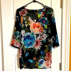 Sheer quarter length sleeve floral tunic